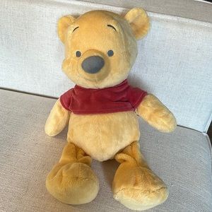 DISNEY- baby Winnie the Pooh stuffy LIKE NEW